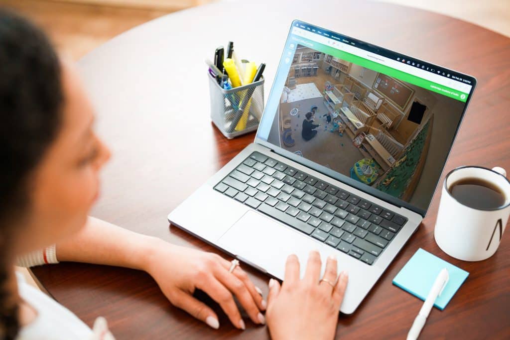 A person looking at a laptop.
